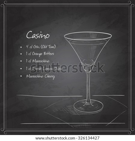 Cocktail casino on black board with ingredients. Alcohol cocktails theme.