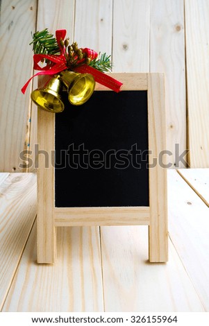 Blackboard sign with Christmas bells