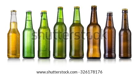 set of Beer bottles with water drops on white background.Five separate photos merged together.