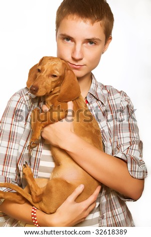 girl  holding a dog