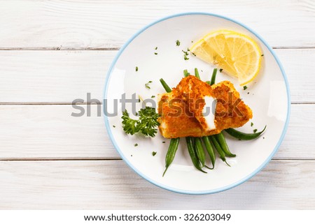 Fish dish - fried fish fillets and vegetables