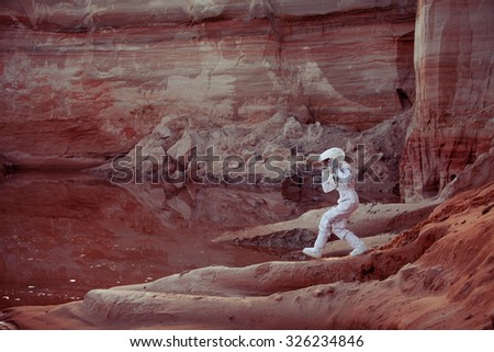 Water on Mars, futuristic astronaut, image with the effect of toning