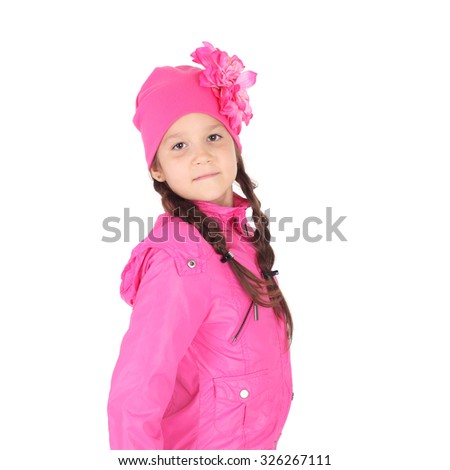 pretty little child in the jeans, pink jacket and cap