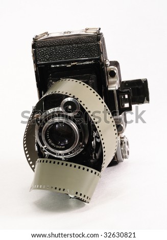 Photographing of a camera and photographic accessories in a still-life