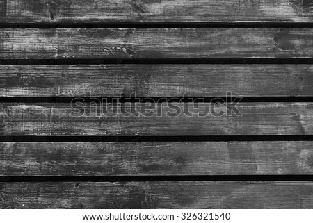 Grey dark wooden background. 
