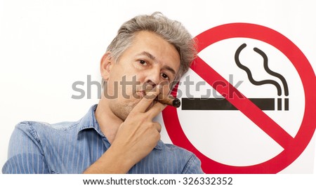 Man. No smoking concept a no smoking sign