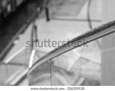 Water and rain drops on the glass, abstract view