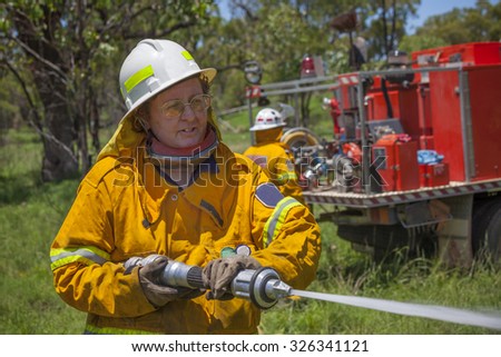 Fire fighter in protective clothing