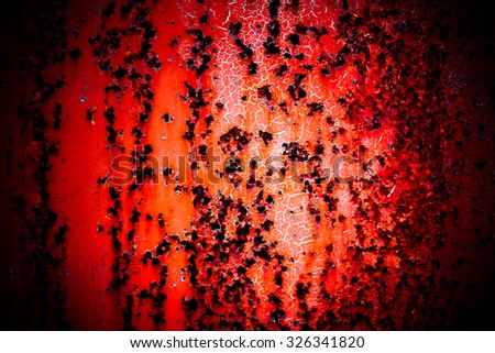 Grunge wall background with color cracks peeling paint and scratches on metal, old background with light ray