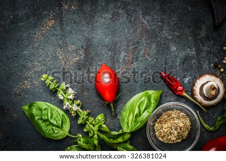 Basil and Tomatoes in rustic wooden background, ingredients for cooking or salad making, top view