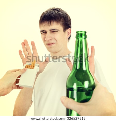 Toned Photo of Young Man Disclaim a Cigarettes and the Alcohol