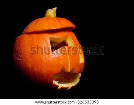 Pumpkin for Halloween isolated on black background.