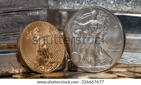 American Gold Eagle vs. Silver Eagle Royalty-Free Stock Photo #326667677