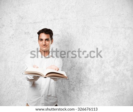 happy young man with small book
