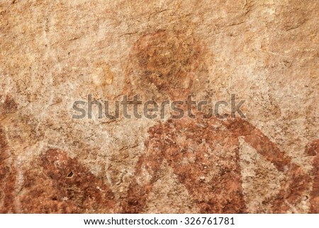 Rock paintings illustrated a human body hunting activity with red ancient color on an archeological site at Phuprabat National Park Udornthani Thailand