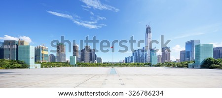 empty, modern square and skyscrapers in modern city