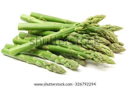 Fresh green asparagus on white Royalty-Free Stock Photo #326792294