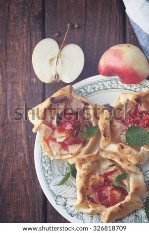Small homemade pie with apple and mint