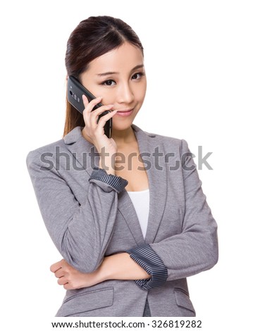 Asian Young businesswoman chat on mobile phone