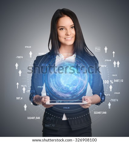Young girl holding tablet in hands of a virtual digital globe and icons on sides.