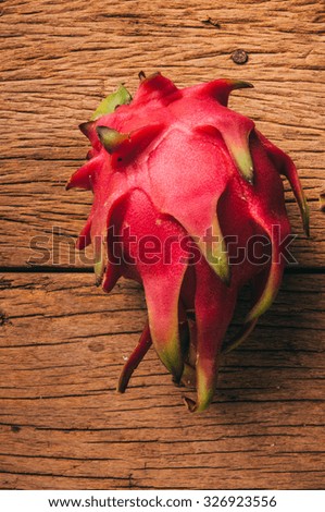 Dragon Fruit, Fresh Organic Harvest on Wood Table Background. Idea of Vibrant and Healthy Food. Country Rustic Still Life Style.