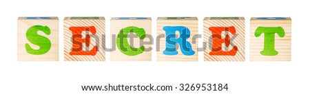 wooden blocks with the word secret isolated on a white background