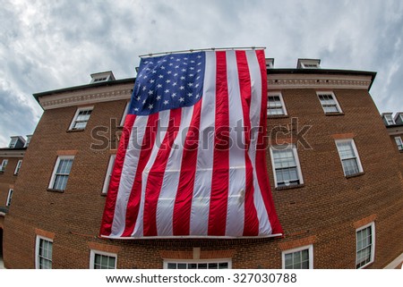 giant american star and stripes flag in alexandria city hall
