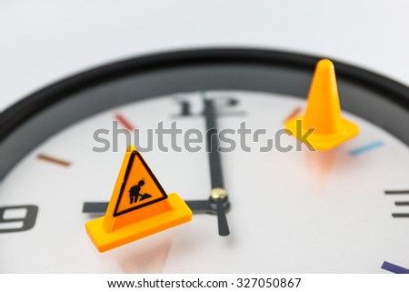 abstract background of under construction on clock.