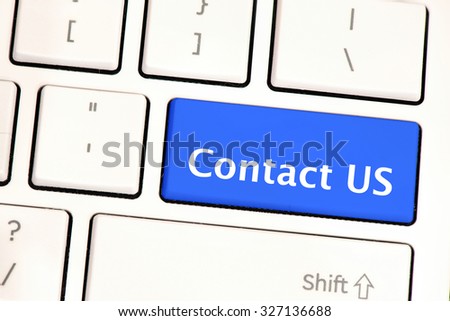 Computer white keyboard with contact us