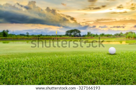 golf ball on green.