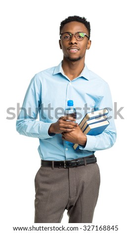 Happy african american college student with books and bottle of water in his hands standing on white background