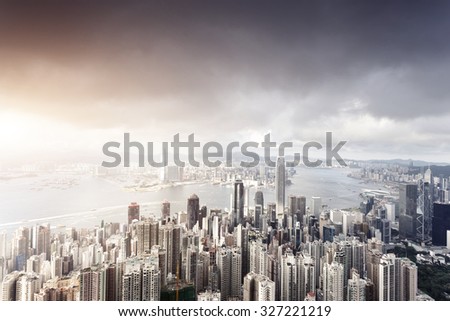 panorama of skyscrapers and a river around the city under sunshine