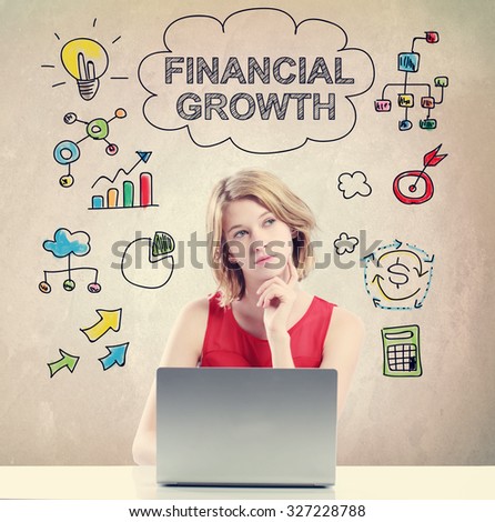 Financial Growth concept with young woman working on a laptop 