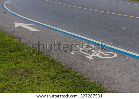 The bike path emblem.Bicycle road sign on asphalt.