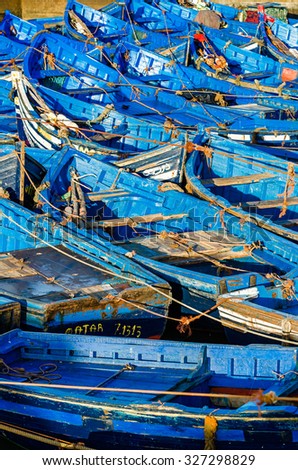 Beautiful array of blue boats in Essaouira port, Morocco