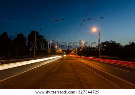 Night traffic in the city. Picture taken on a tramway line