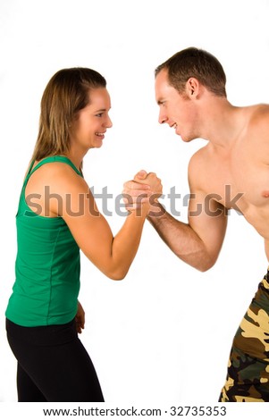 young couple in an arm wrestle