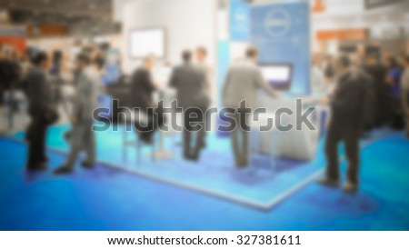 People, trade show background. Intentionally blurred post production.