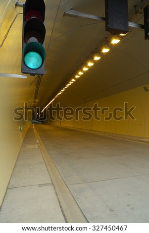 Highway Tunnel  with light and signs
