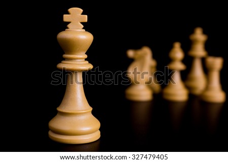 Chess photographed in isolation on a black background