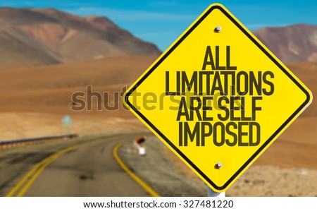 All Limitations Are Self Imposed sign on desert road Royalty-Free Stock Photo #327481220