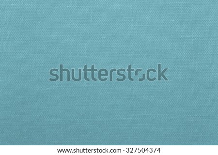 Turquoise blue cotton cloth fragment for use as an advertisement backdrop/message, or for use as  wallpaper.