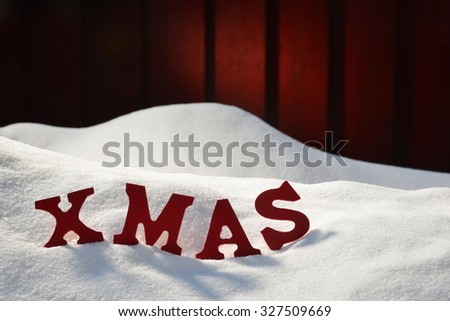 Red Letters On White Snow As Christmas Card. English Word Or Text Xmas. Snowy Scenery And Atmosphere. Rustic Vintage Wooden Background