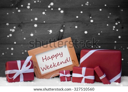 Red Christmas Decoration On Snow, Snowflakes, Christmas Gifts, Presents. Brown, Picture Frame With English Text Happy Weekend. Rustic, Vintage Gray Wooden Background. Black And White Image
