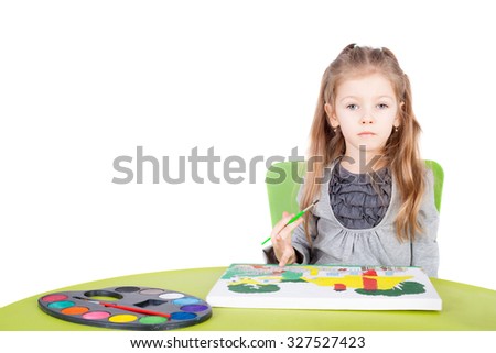 cute little talented girl painting