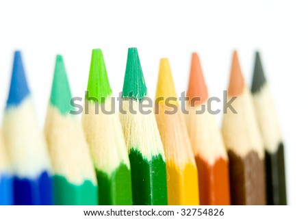 Coloured crayon line up side by side