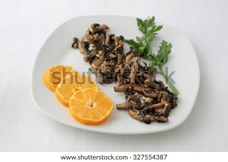 dish of fried mushrooms with garlic and parsley