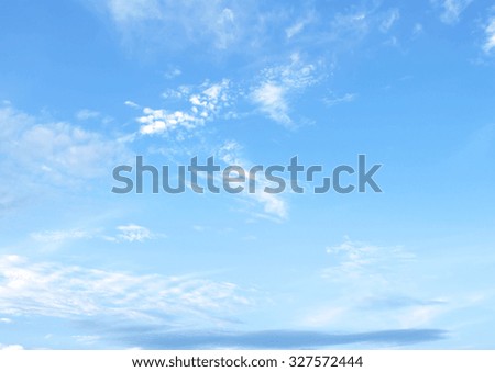 Fantastic soft white clouds against blue sky