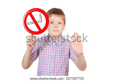 Child with a sign prohibiting smoking, the concept of "no smoking".
