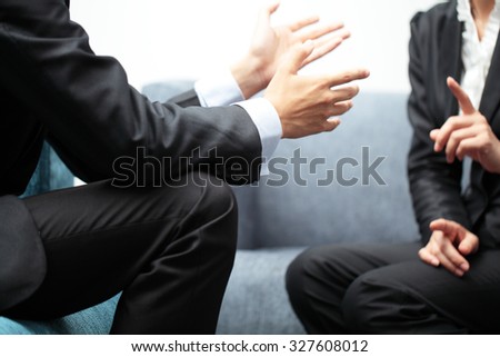 Business Meeting Discussion Between Two People in Suit Royalty-Free Stock Photo #327608012